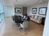 Light wood-finish flooring complements the modern interior