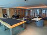 Spacious common area featuring a billiards table, grand piano, and recessed lighting