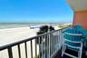 A LARGE PRIVATE BALCONY TO ENJOY BREATHTAKING VIEWS OF THE SUGAR-SAND BEACH