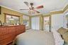 Generous proportions provide flexibility for bedroom furnishings and additional storage.
