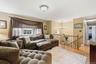 Natural light enhances the warm and inviting atmosphere of the main living space.