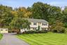 A welcoming exterior and attractive setting create an impressive first arrival.