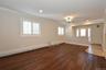 Entry Foyer & Living Room with plantation shutters