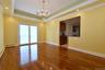 Dining Room with a tray ceiling & sliding door to the back yard.