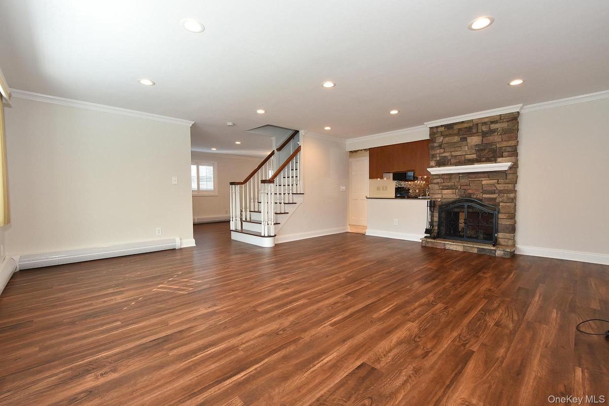 Den with Double Sided Fireplace