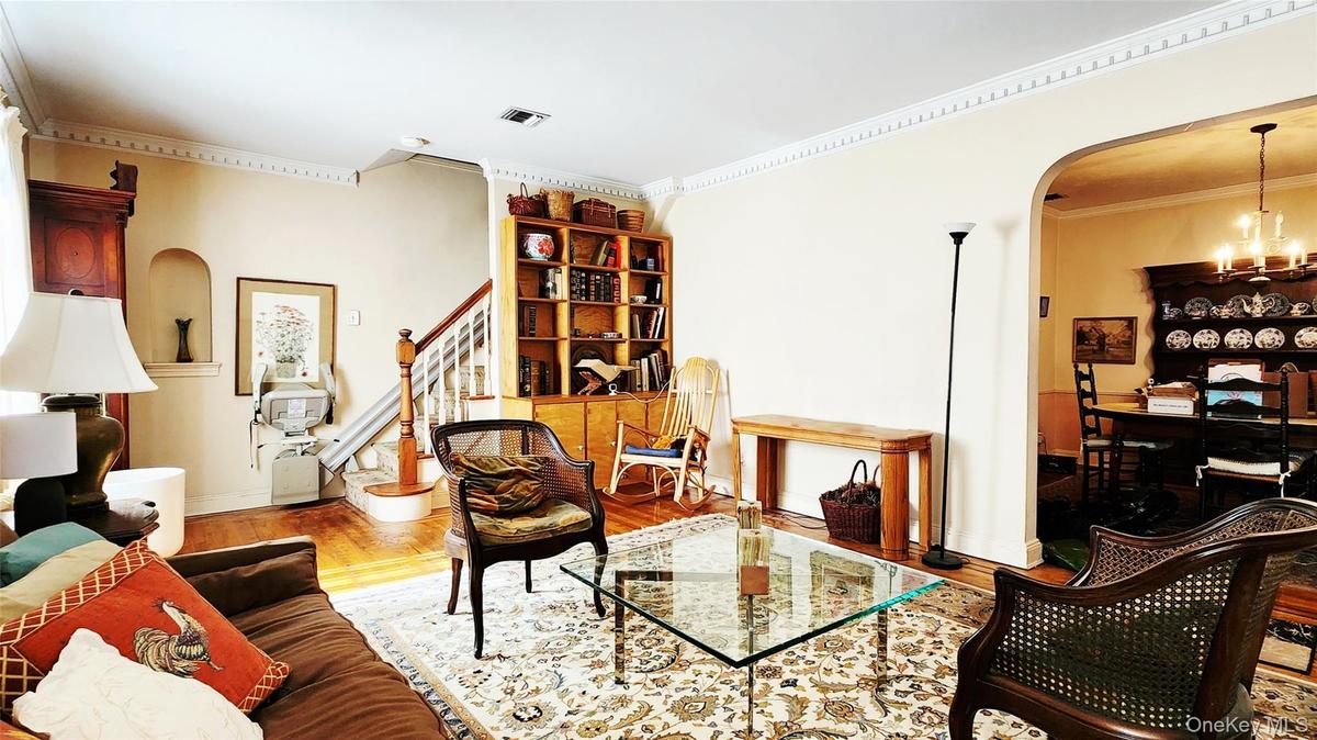 Living Room, Formal Dining Room, and Stairs to Bedrooms