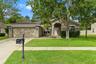 Set along a sidewalk-lined street in Gulfwinds, this 2,480-square-foot home offers plenty of room inside and out.
