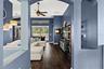 Architectural details add definition and character while preserving the open flow buyers love for everyday living.