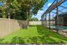 Pet-safe turf creates a clean, low-maintenance yard where four-legged family members have room to run.