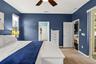 Tucked into the split-bedroom floor plan, the primary suite creates a private retreat away from the secondary bedrooms.