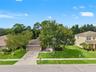 From above, the home’s single-story design, mature landscaping, and established Gulfwinds setting come into view.