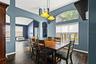 Open sightlines between the dining and living areas make the floor plan feel spacious without sacrificing defined rooms.