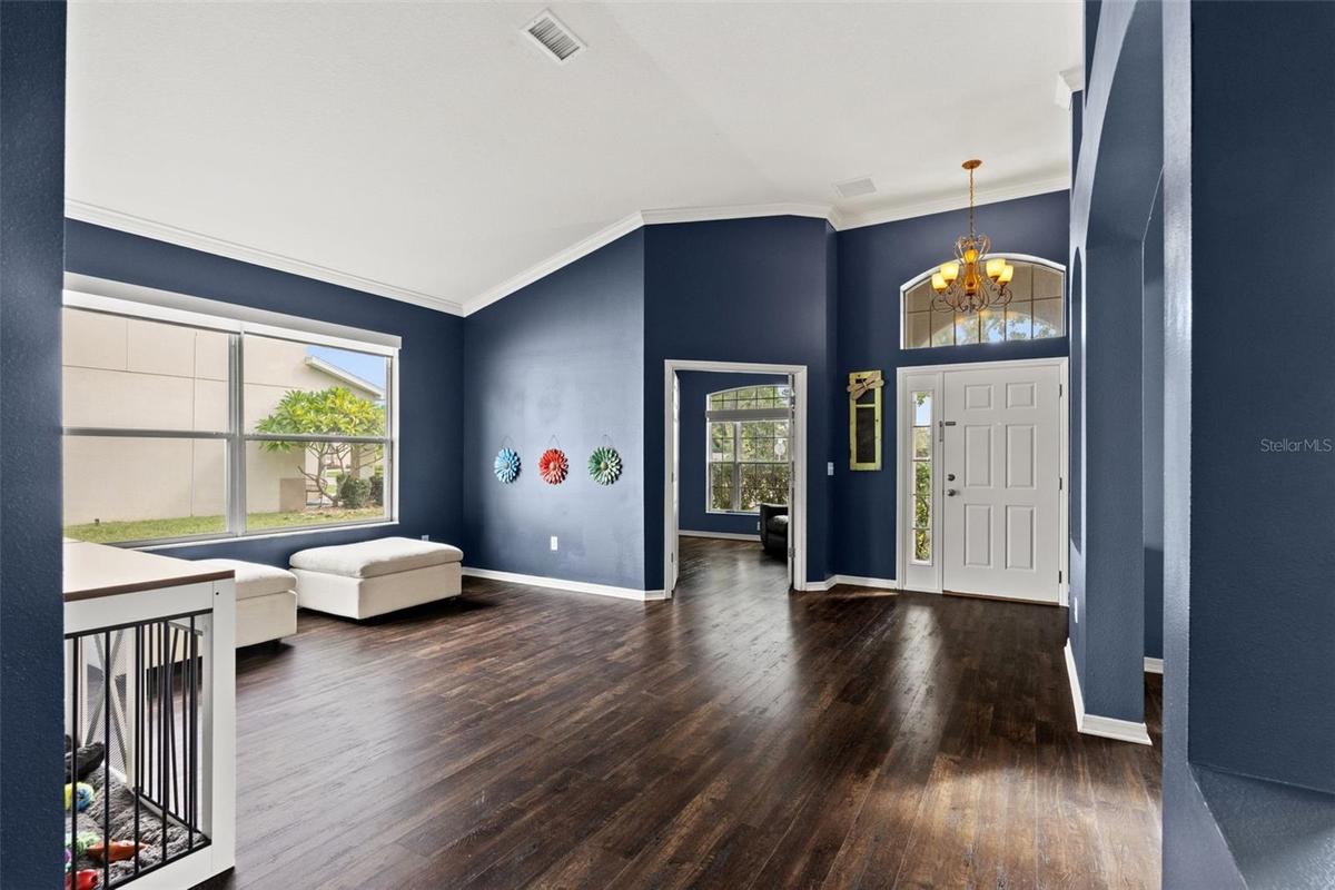 The front living area offers flexible space for entertaining, relaxing, or creating an additional conversation area.