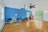 Spacious Primary Bedroom with Cathedral Ceilings and Sliders to Private Deck
