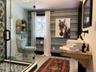 The hall bathroom and private entrance off secondary bedroom