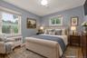 Virtually staged second bedroom located on the first floor