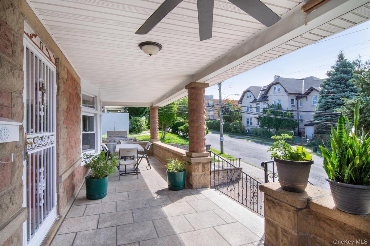 Large Covered Front Porch with Ceiling Fan