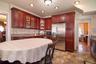 Eat-in-Kitchen stainless steel appliances and recessed lighting