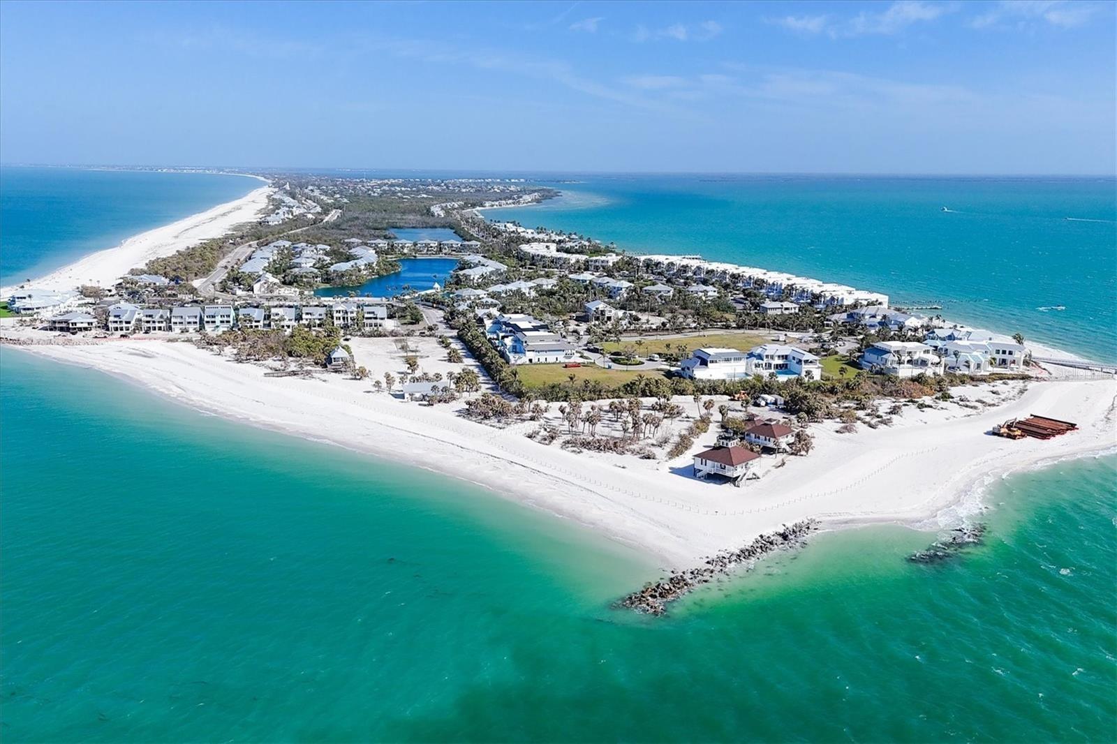 Welcome to Hill Tide Estates - the crown jewel of Gasparilla Island, Florida, with framed views of the iconic Port Boca Grande Lighthouse