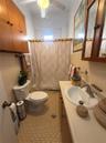 Complete bathroom with bath tub