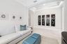 View from the den/flex space to the hall.  This spa can be used as an office, dining room, or enclosed as a 4th room for guests