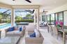 The spacious lanai can accommodate multiple areas for entertaining and relaxation