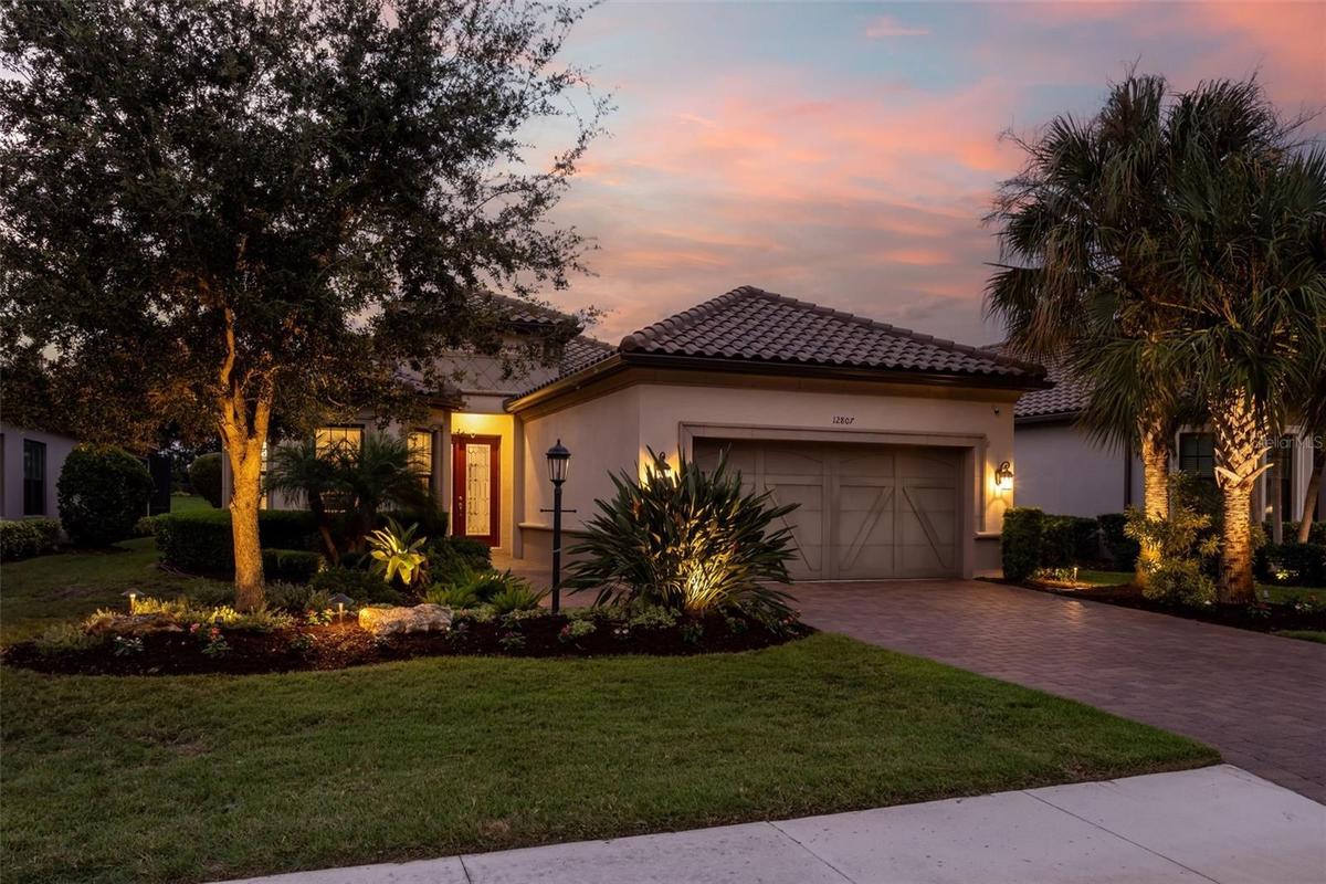 Landscape lighting accents the front