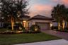 Landscape lighting accents the front