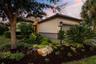 Lush, professionally landscaped front yard