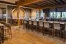 Plenty of seating at the bar, at high-tops, and tables for four or more.
