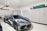 The 525 sq ft, 2 car garage has an epoxy finished floor and a wall of removable storage cabinets