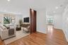 Den/home office is ideally situated off entry hall (virtually staged).