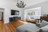 Spacious family room offering flexible space for dining and entertaining.