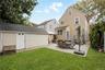 Backyard with Patio and 1-car detached garage.