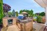 Built In 48in viking grill, Lynks Fridge and Large Bar Top