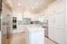 Double Wall Ovens, Wolff induction Cooktop, XO Exhaust