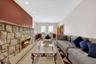 Grand living room with wood burning fireplace