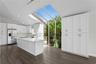 This gorgeous kitchen features stainless steel appliances (new in 2020) and stunning quartz countertops.