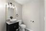Beautifully appointed powder room with elevated finishes