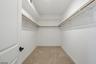 Expensive primary walk-in clo