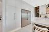 Seamlessly integrated refrigeration and custom cabinetry designed for a clean, modern aesthetic and efficient workflow.
