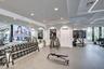Fully equipped fitness center featuring modern strength and cardio equipment.