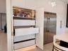 Thoughtfully designed deep drawers and built-in storage maximizing functionality while maintaining a sleek, minimalist look.