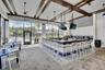 Covered outdoor lounge and dining area offering shaded seating and an inviting space to relax or entertain.