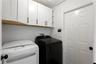 Dedicated laundry room conveniently located off the kitchen and garage.