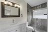 Stylish, updated en-suite bath for added privacy.