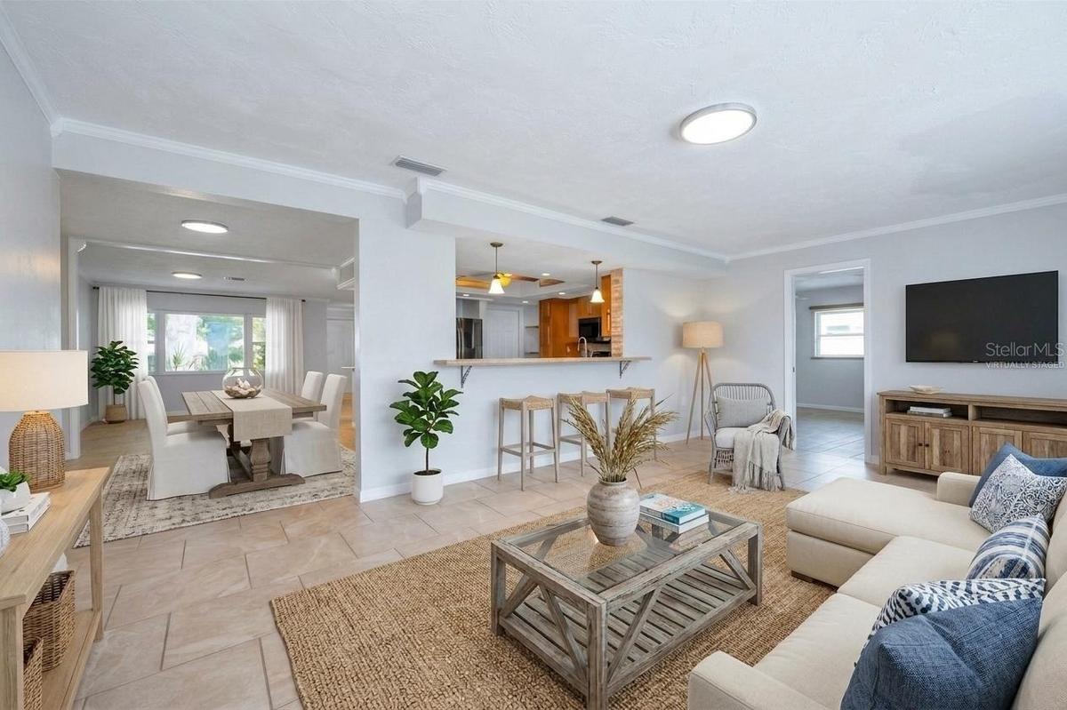 Virtually Staged Family Room looking into the Kitchen