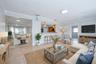Virtually Staged Family Room looking into the Kitchen