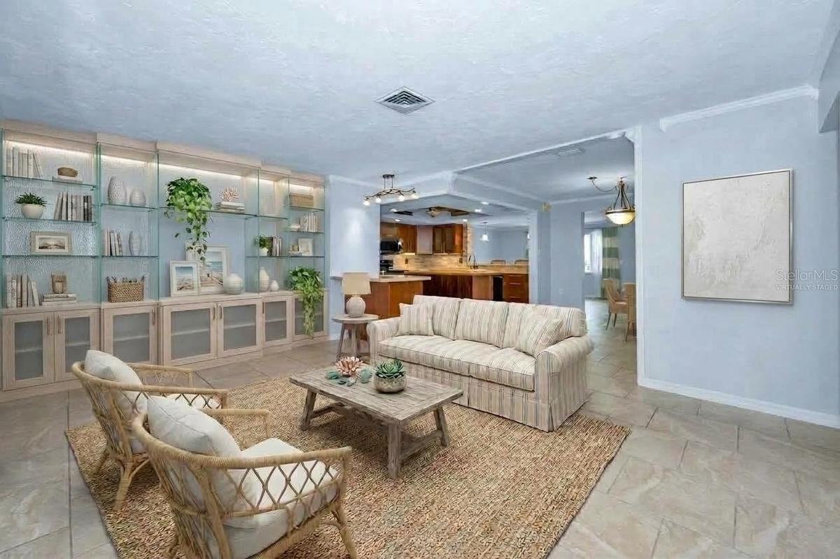 Virtually Staged Living Room looking into the Kitchen