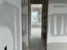 Bedroom view going into shared bath